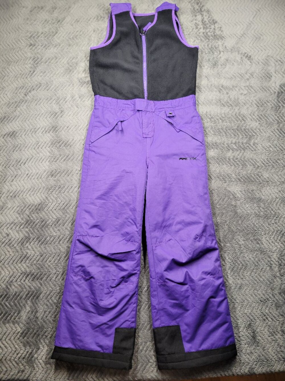 Arctix youth snowsuit  size small purple and black good condition